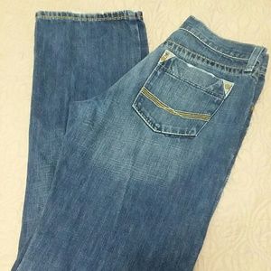 Men's Ariat jeans.
